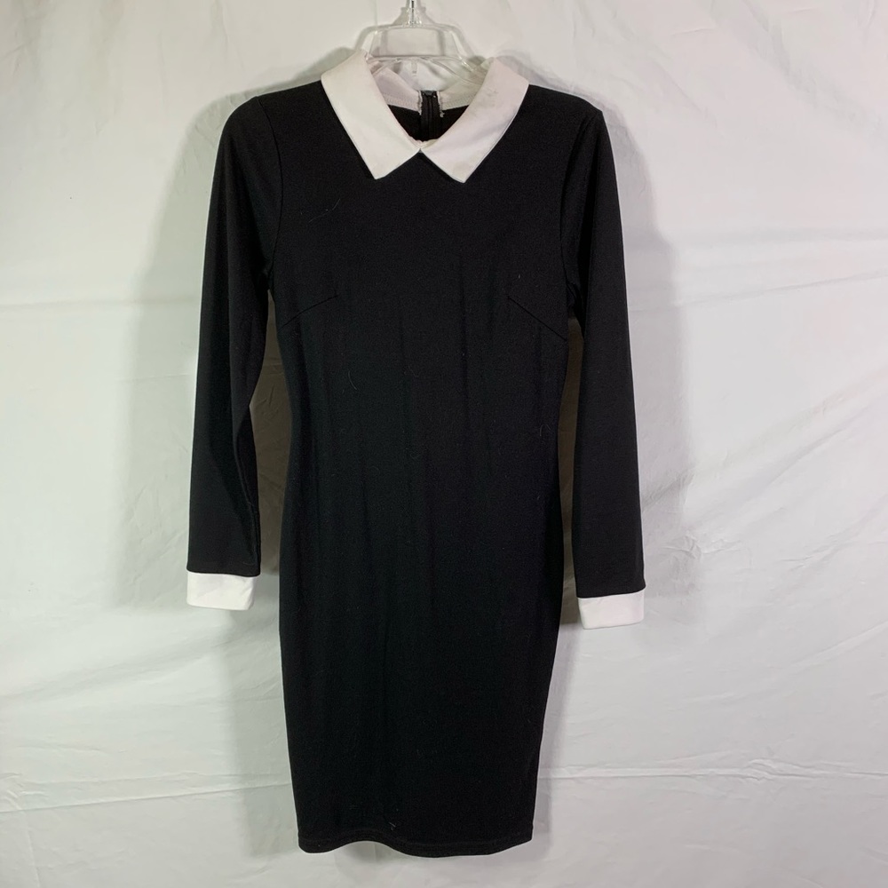 Black body con dress with white details